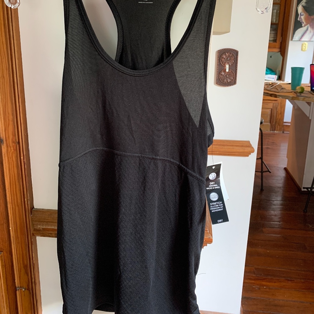 Zeros black racer back workout tank. Side tightening. Runs a little‎ big